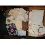 suitcase and box of linen and fabric footstool for upholstery