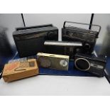 collection of retro radio's and an instamatic camera