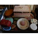 collection of tins and a sewing basket with contents