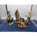 4 figurines: sorcerer, clown (end of shoe broken)worker and fisherman