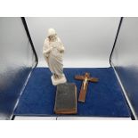 Alabaster figurine of Jesus with bible and crucifix