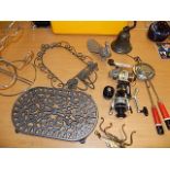 metal bell, cast peacock, fishing reels, trivet etc