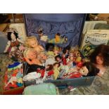 Suitcase full of retro and vintage dolls to include Barbie and dolls clothes, accessories and a