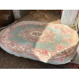 Oval patterned rug 68 x 48 inches