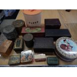 collection of tins and boxes including a tea caddy and retro flour bin