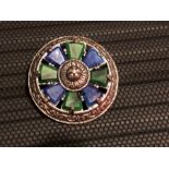 Vintage Celtic style shield brooch with glass gemstones by British designer Miracle.