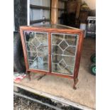 Glazed corner cabinet with stick on lead on panels on pad feet with one shelf inside 31 inches