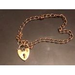 Yellow metal bracelet with 9ct heart padlock clasp 5.82 grams