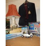 Mixed lot of sundries to include remote control helicopter, oriental style lamp, box of china dolls,