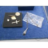 Rolled Gold Crucifix , Gold front and back locket , Aluminium flute brooch etc