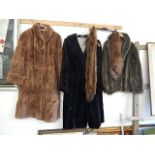 3 fur coats, 2 long and one short and 2 fur stoles