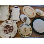 assortment of china plates and dishes