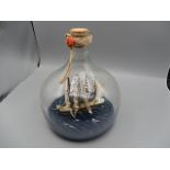 Ship in a bottle, looks handblown 24cm tall 25cm diameter