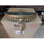 Gilt side table with marble top, screws to the wall. 48x23cm