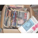 A box full of NME newspapers from mid 80's