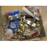 box of door fixings such as handles, hinges etc