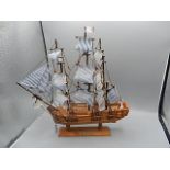 HMS bounty model ship and smaller model ship
