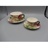 Gein china volupte cup and saucers, large and small