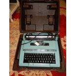 Smith Corona typewriter in case