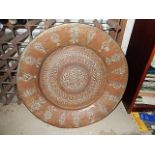 Large copper charger with eastern inlayed design 26" across