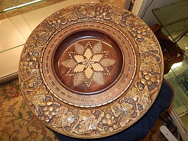 Heavy plaster dish with wooden inlay plate 36cm across