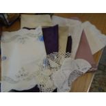 collection of tablecloths and linens