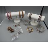 surplus stock from local jewellers, all new and unworn. 3 wide bangles, 4 bangle sets 2 rings,