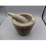 Stone pestle and mortar 14cmtall x 18cm across