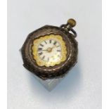 A ladies swiss open face pocket watch, white dial with Roman numerals and gilt scroll decoration,