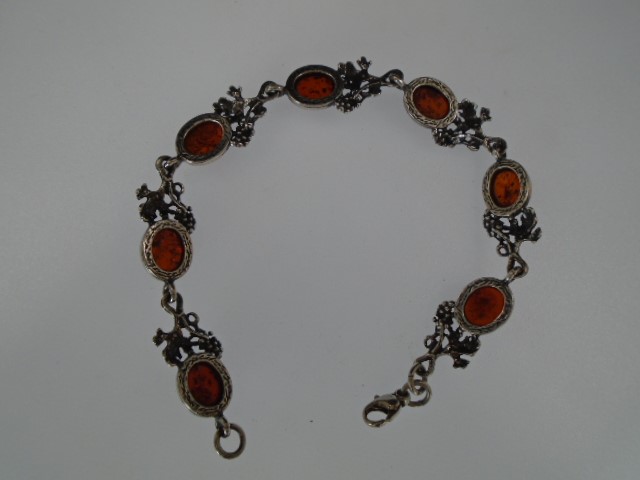 A white metal 'Amber' bracelet, 20cm with grape vine decoration. - Image 2 of 4