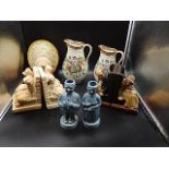 2 sets of bookends, 2 china jugs, 2 polycrol advert figures and blue and white jug and handled dish