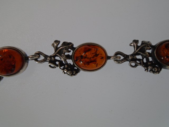 A white metal 'Amber' bracelet, 20cm with grape vine decoration. - Image 4 of 4