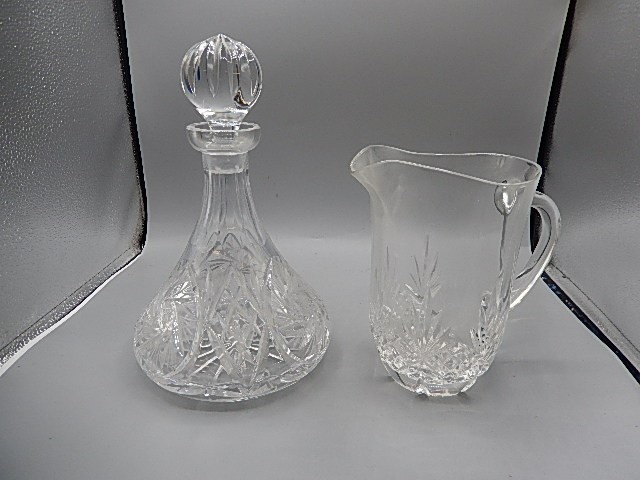 Ships decanter and cut glass jug (small chip on decanters rim)