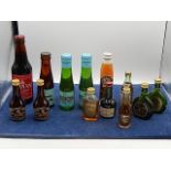 collection of miniatures to include babycham, courvoisier (brandy xo bottles are empty