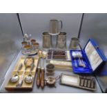 collection of silver plated and stainless steel items to include napkin rings, sugar crushers,