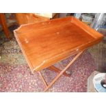 Mahogany Butlers Tray with folding mahogany stand . Tray is 29 x 19 inches stand is 30 inches tall