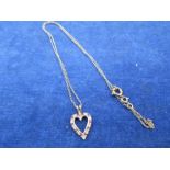 9ct gold chain with yellow metal heart pendant