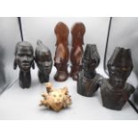 Treen African figure heads, book ends and driftwood lion head figure