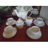 ER11 Golden Jubilee tea for 4 in white with gold trim