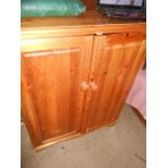 Modern Pine 2 Door Cupboard ( woodworm ) 36 wide 44 inches tall 18 deep