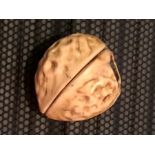 Carved oriental walnut with erotic scene inside