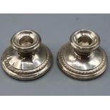 Pair of Sterling Silver Candlesticks ( dented ) 2 inches tall