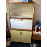 Vintage Kitchenette missing the glass from one sliding door