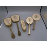 vintage dressing table items, 2 hand held mirrors and 3 brushes