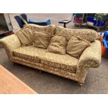 Antique style 3 seater sofa with brass castors on front legs