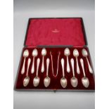 Walker & Hall Cased set of 12 silver tea spoons and silver sugar tongs