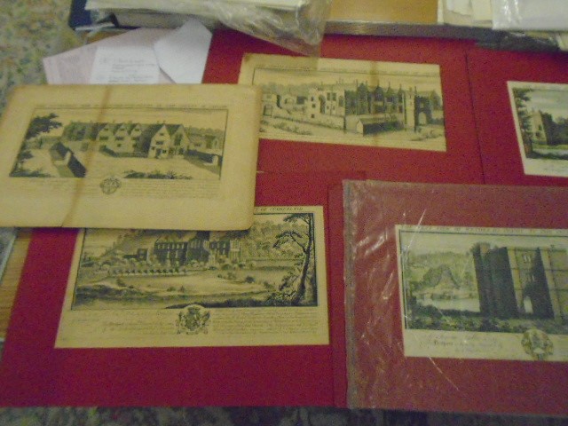 7 prints of castles on red mounts (appear vintage) each 14.5x7.5"