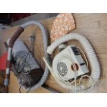 vintage hoover and vintage hair drier, both for display or re-enactment purposes
