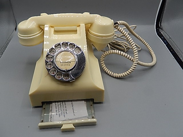 Bakelite phone 300 series in Ivory, known as the cheese tray telephone with original paperwork. Dial