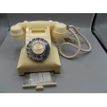 Bakelite phone 300 series in Ivory, known as the cheese tray telephone with original paperwork. Dial